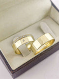 Aliança em Ouro 18k Reto com Frisos 7mm com 1 Brilhante central + 20 Brilhantes no aro